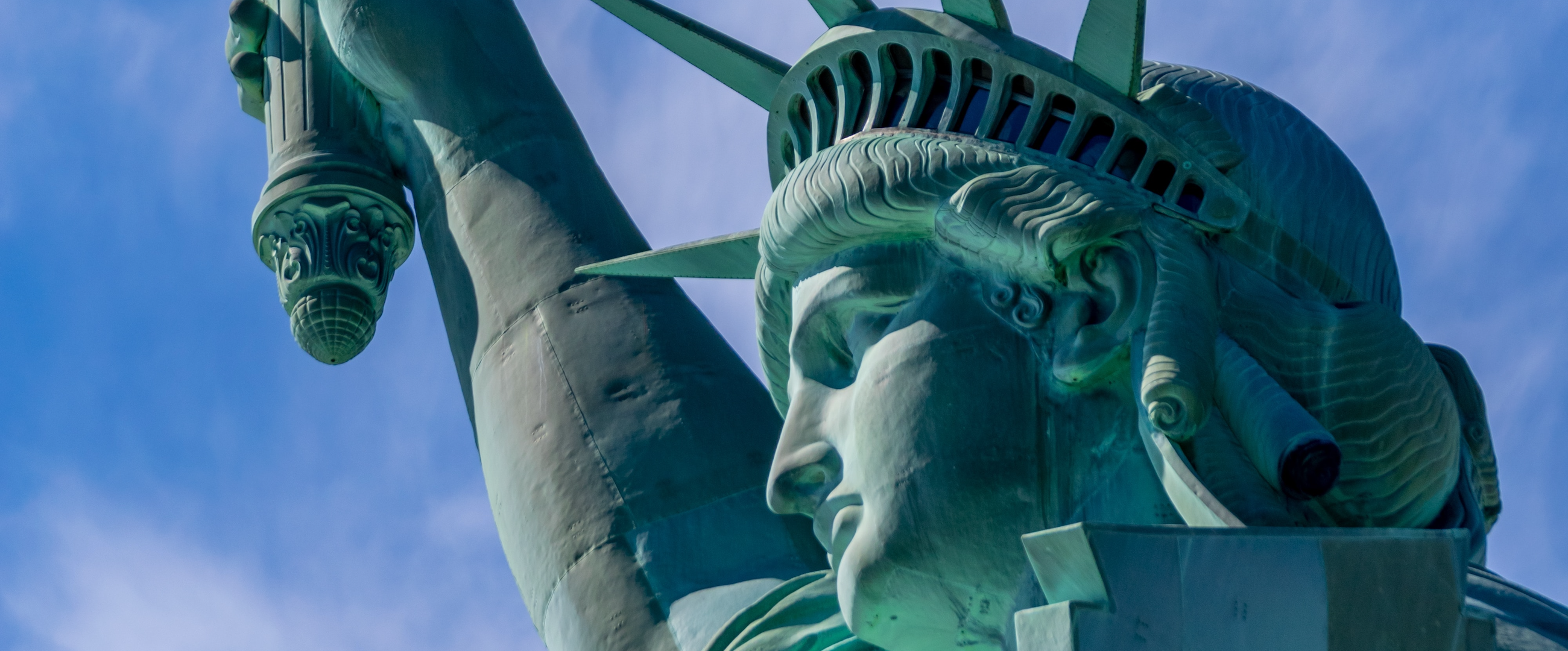 Close up of the face of the Statue of Liberty, a colossal neoclassical sculpture located on Liberty Island in New York Harbor in New York City, United States